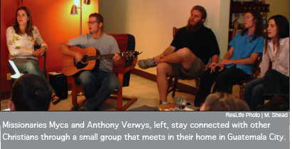 Missionaries Myca and Anthony Verwys, left, stay connected with other Christians through a small group that meeting in their home in Guatemala City.
