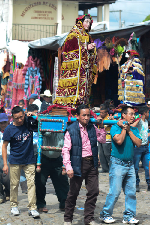 Men carrying the images of saints through the streets of Chichicastenango on All Saints Day Nov. 1, 2016.