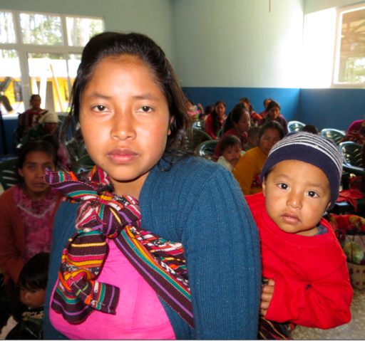 2-year-old Maricio is only 17 pounds here he is a the ASELSI milk program with his 19-year-old mom.