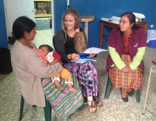 Chrisi met with Angelina, held by her mother at left, to try and help her gain weight. She's 1 year and 3 months old but only weighs as much as a baby less than half her age.