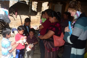 Chrisi praying with the boys who accepted Christ.