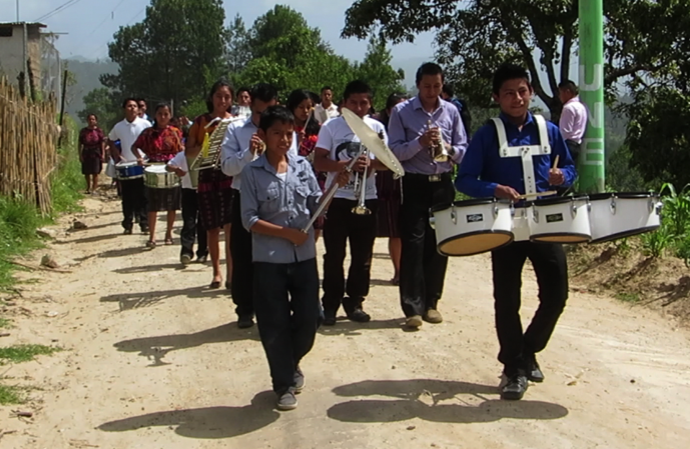 The church worship team opened the church service with a marching band parade leading to the church building.
