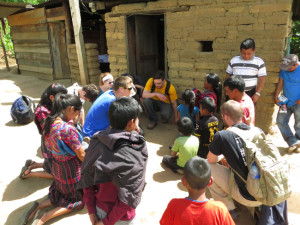 Praying with a family the team had worked with two years ago.