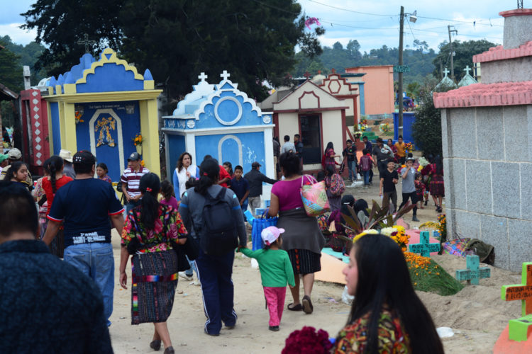 Crowds of family members visit the cemetery on All Saints Day, Nov. 1 in Chichicastenango.